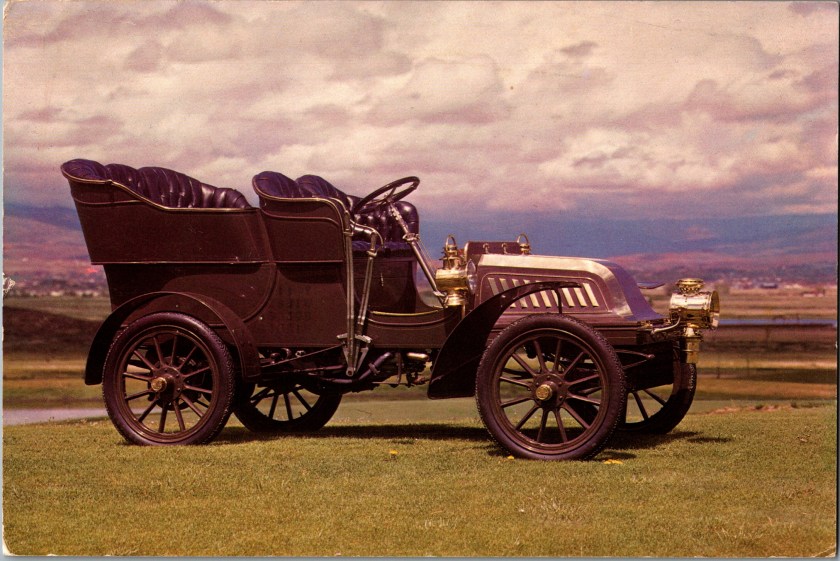 Vintage advertising postcard front, 1903 Thomas Tonneau automobile, photographed at Harrah's Automobile Collection, Reno, Nevada