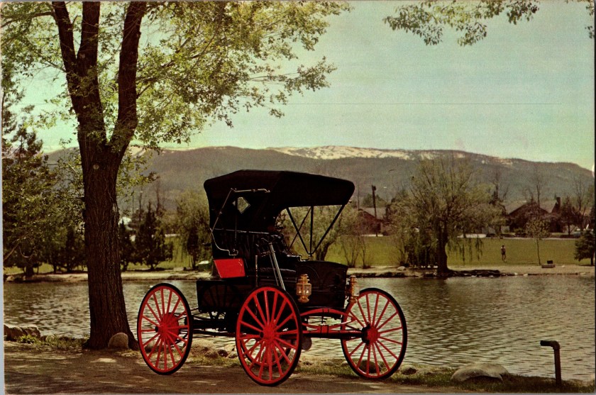 Vintage advertising postcard front, 1909 Black Motor Buggy automobile, Harrah's Automobile Collection, Reno, Nevada